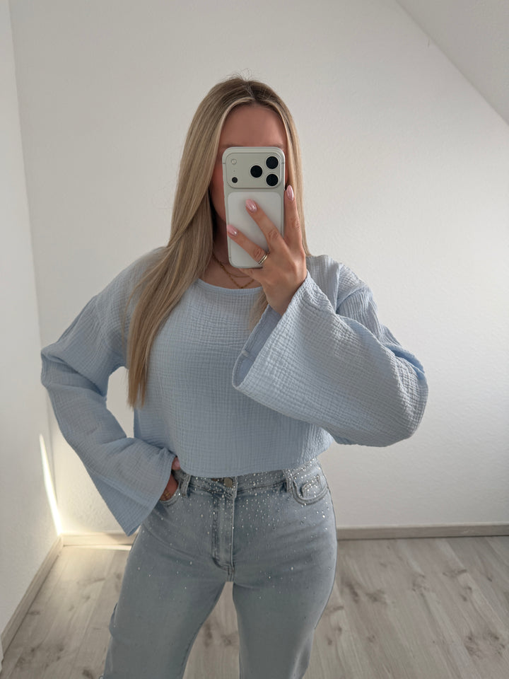 MUSSELINSHIRT MIT TROMPETENÄRMELN